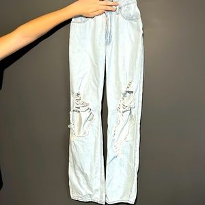 blue jeans with knee rips